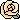 pixel art of a yellow rose with the leaf sticking out to the right