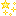 pixel art of a yellow star with sparkles
